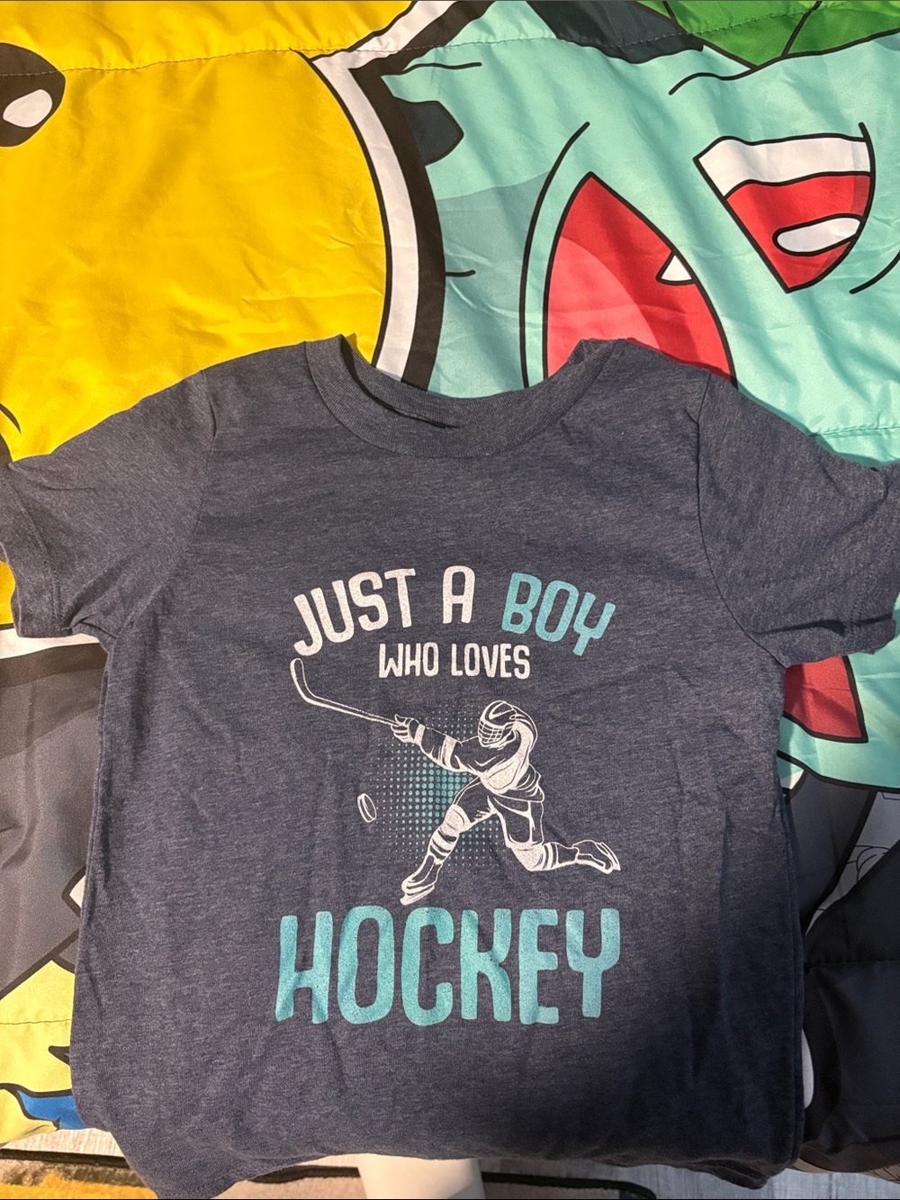 Just A Boy Who Loves Hockey Graphic Tee - Blue